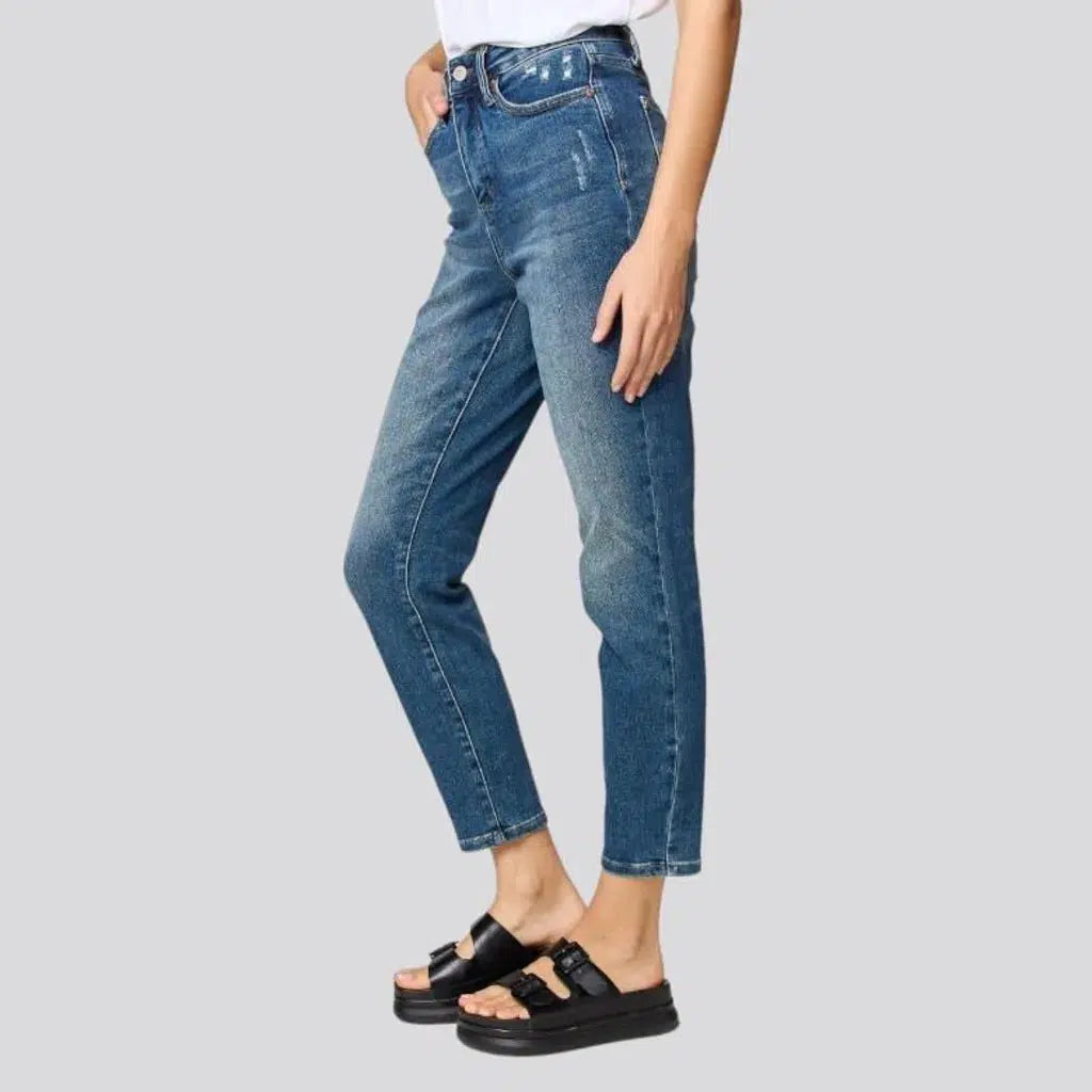 Stonewashed whiskered jeans for women