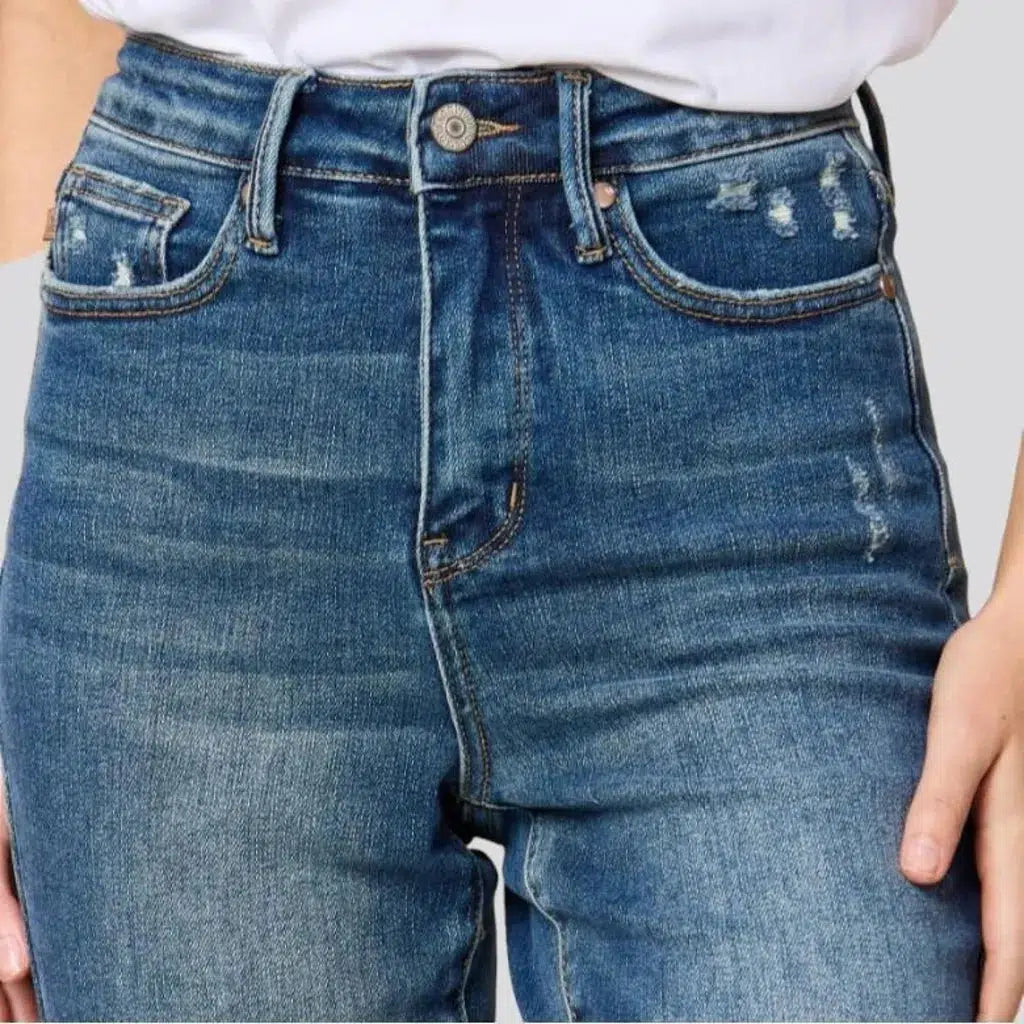 Stonewashed whiskered jeans for women