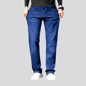 Stretchy men's mid-waist jeans