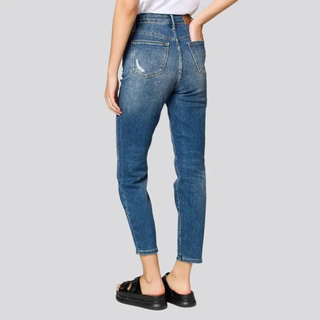 Stonewashed whiskered jeans for women